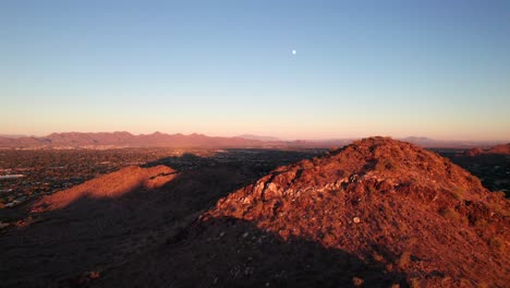 long slow peaceful nature aerial clip. arizona mountains and desert at dusk, ambient background shot.