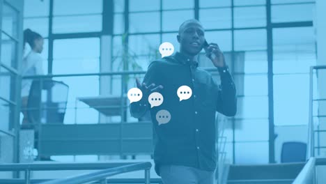 animation of social media reactions over african american man in office having call
