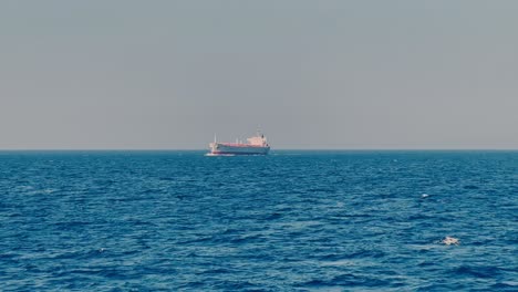 merchant ship sailing as seen from another ship