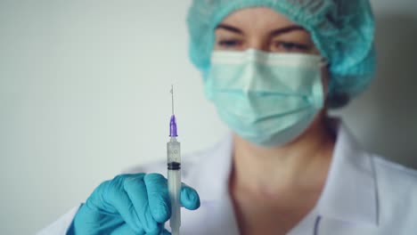 medical worker portrait. confident female doctor in protective face mask and eyeglasses 02