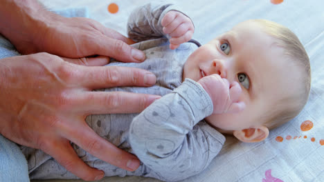 Baby-boy-relaxing-at-home-4k