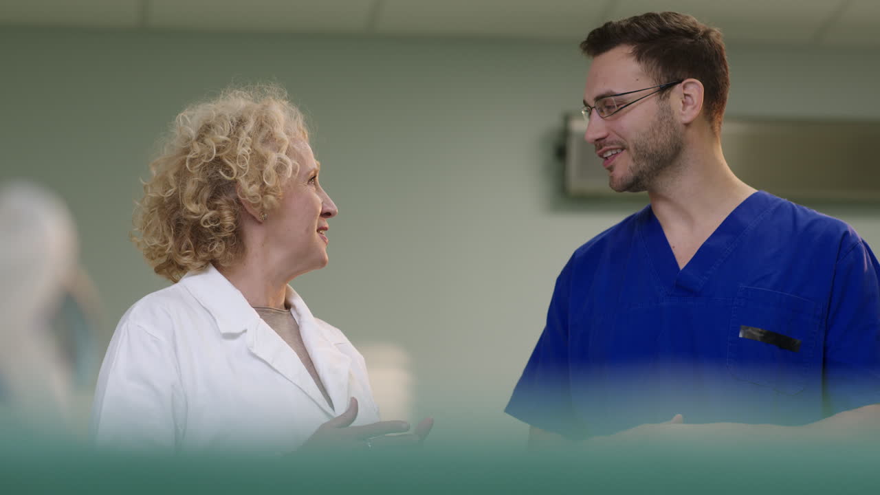 Medical Professionals Discussing Healthcare in a Hospital Setting