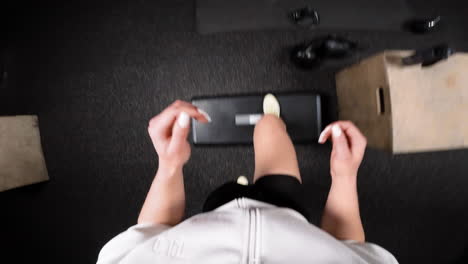 Woman Performing Step-Ups in a Gym