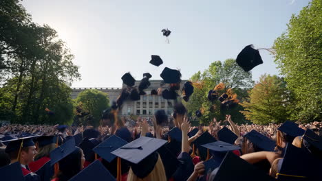 graduation ceremony with tossing mortarboards