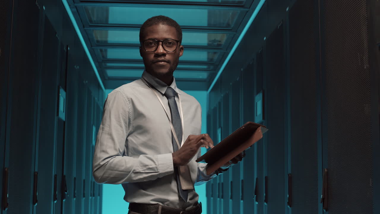 Portrait of IT Technician in Data Center