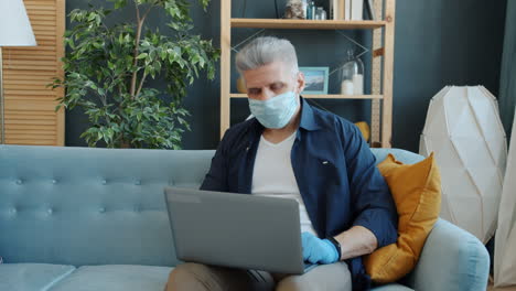 man working from home during pandemic