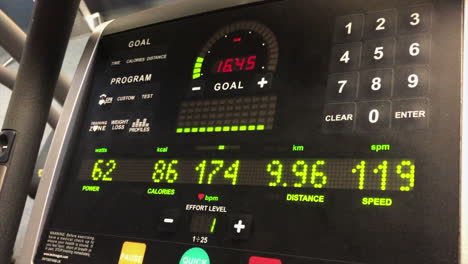 Data-screen-on-a-bike-in-gym,-fitness