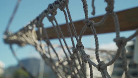 close up shot of the netting on the from of a yacht