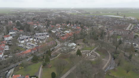 Aerial-of-old-indoor-botanic-garden-in-a-small-green-park