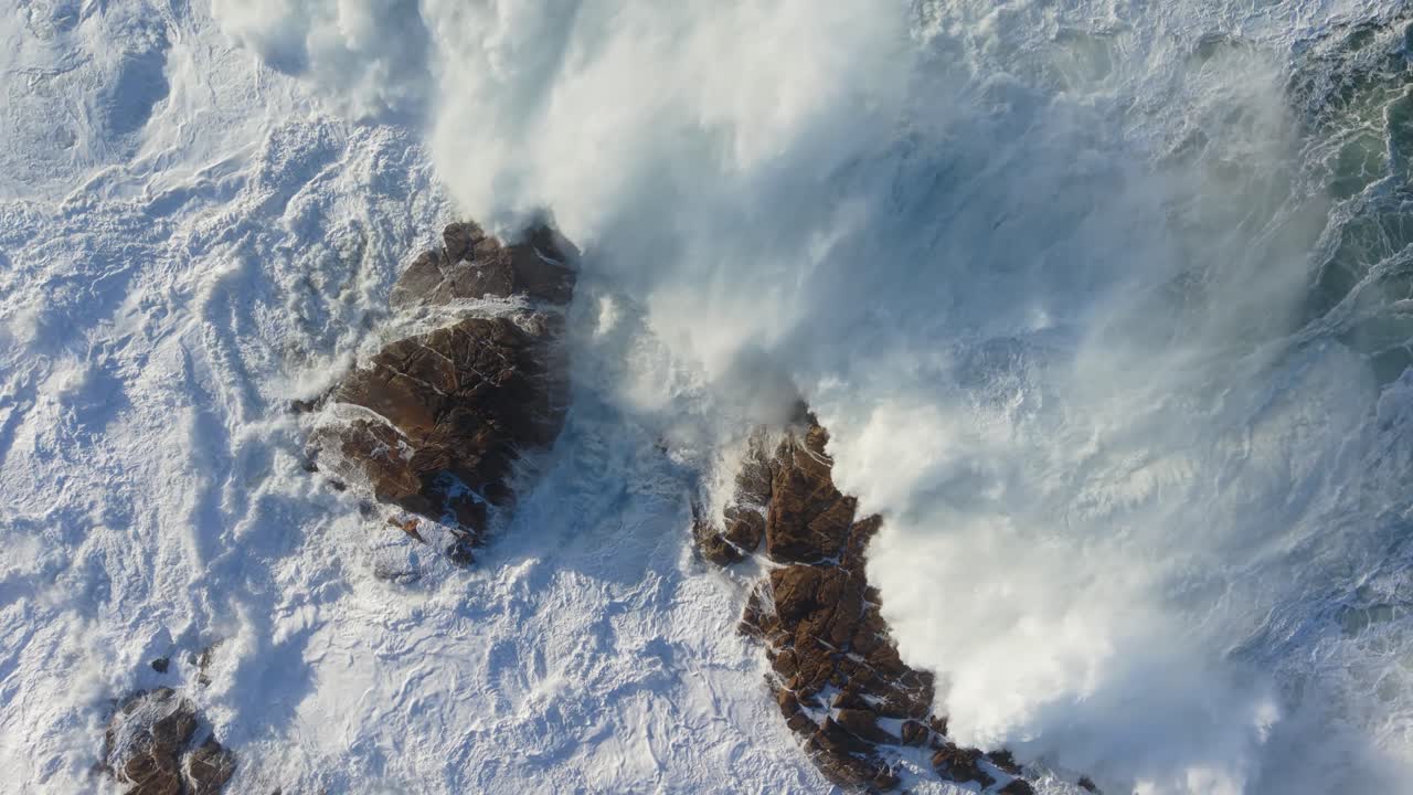 Foamy Ocean Waves Splashing On Rocks - Drone Shot, Slow Motion