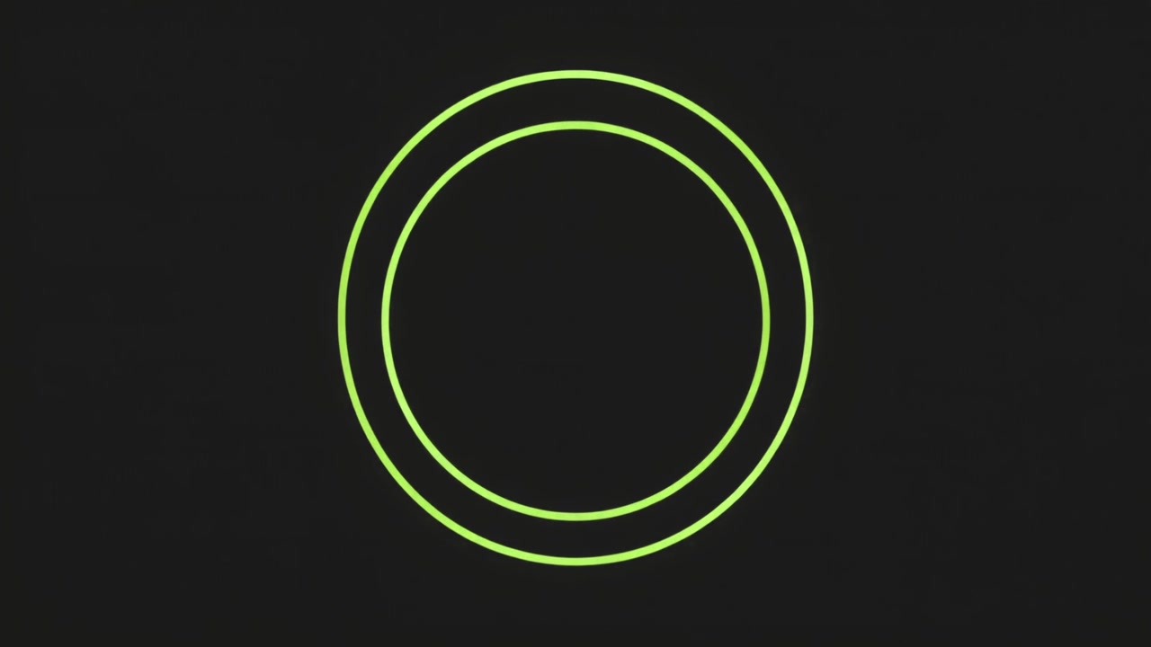 Animated Green Concentric Circles Expanding on Dark Background