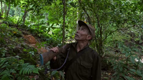 Senior Hunter Walking In Forest