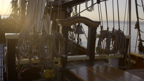 1700s sailing ship underway at sunrise