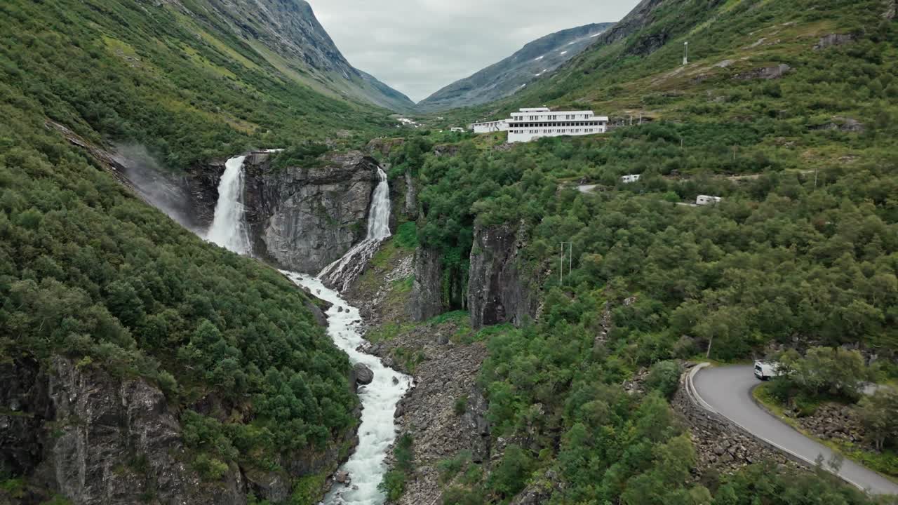 Aerial View of a Stunning Waterfall in a Mountain Valley in Norway