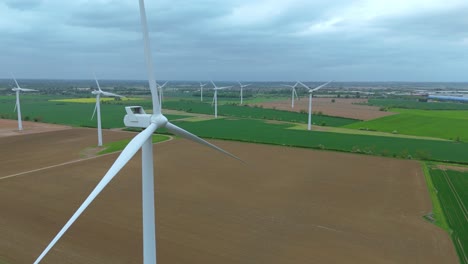 aerial drone view of biggleswade wind turbines in england