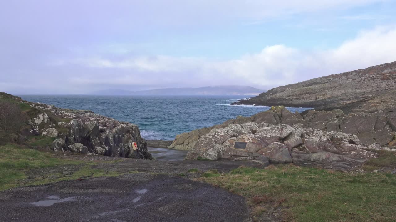 Road to rocky beach and and swimming spot in Bantry Bay West Cork Ireland on a winter morning