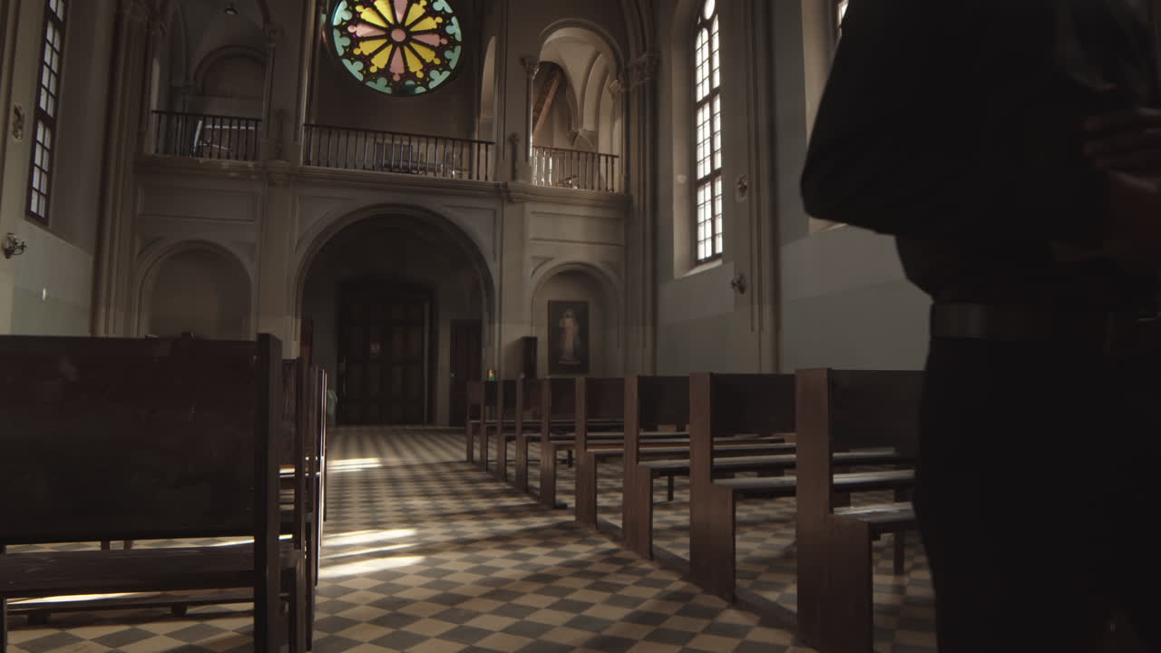 African-American Priest Going along Church