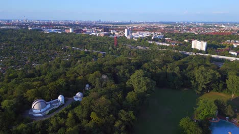 Fabulous-aerial-top-view-flight-Berlin-city-Public-swimming-pool-Germany-in-Europe,-summer-day-2023