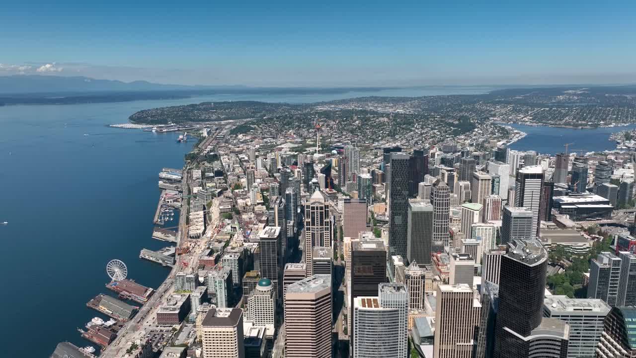 Drone shot of Seattle's downtown skyscrapers filled with apartments