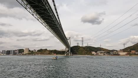 kanmon bridge and the kanmon strait in between the japanese island honshu and kyushu