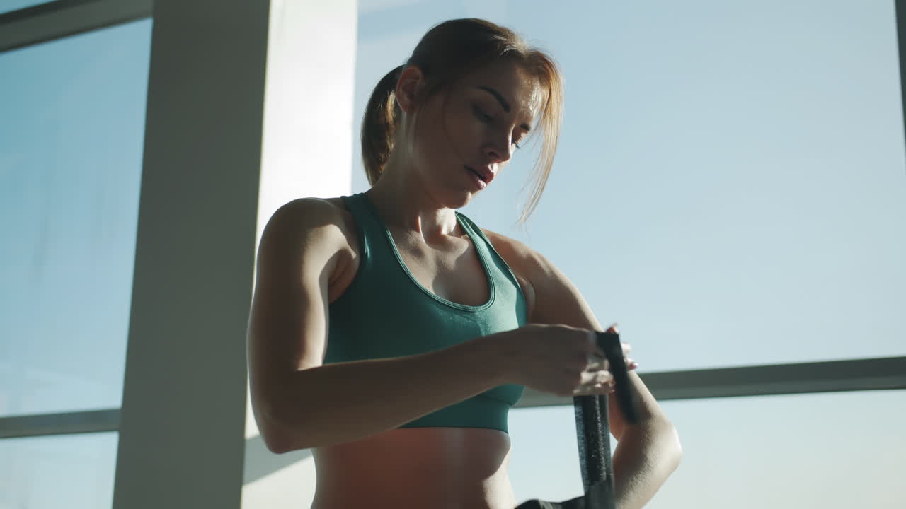 Woman preparing for a boxing workout