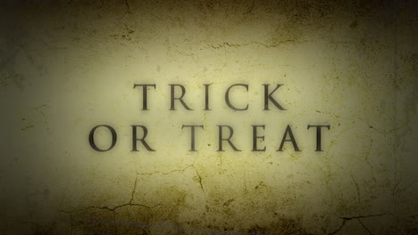 Trick-Or-Treat-on-dark-yellow-grunge-wall