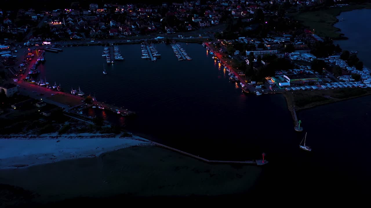 Beautiful Night color sky, sunset by the Baltic Sea, Jastarnia, Poland. Harbor. Aerial View