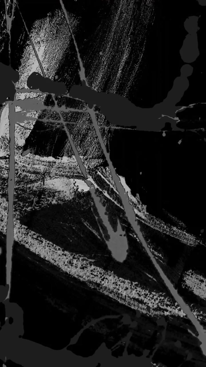 Animazione di forme nere e grigie in movimento su sfondo nero