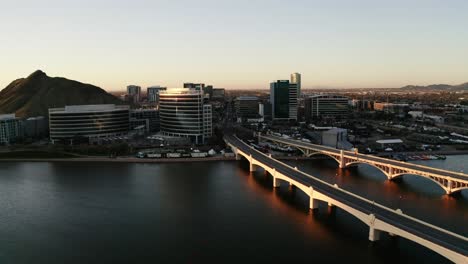 drone shot over tempe, arizona at sunset. empty bridges