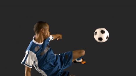 Football-player-kicking-the-ball-