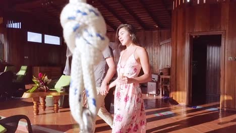 A-Romantic-Man-And-Woman-Couple-On-Vacation-Toasting-Drink-On-The-Balcony-Of-A-Luxury-Resort-Hotel-Room-In-St-Lucia-Caribbean-Islands-1