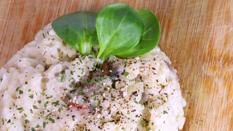 risotto dish on wood surface, macro shot in 4k