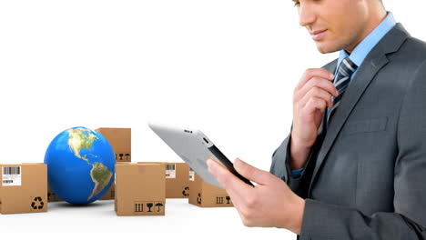 animation of businessman using tablet with stacks of boxes and globe on white background