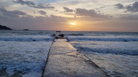 watching-the-stormy-sea-and-the-beautiful-colors-of-the-sky-when-the-sun-fall-down