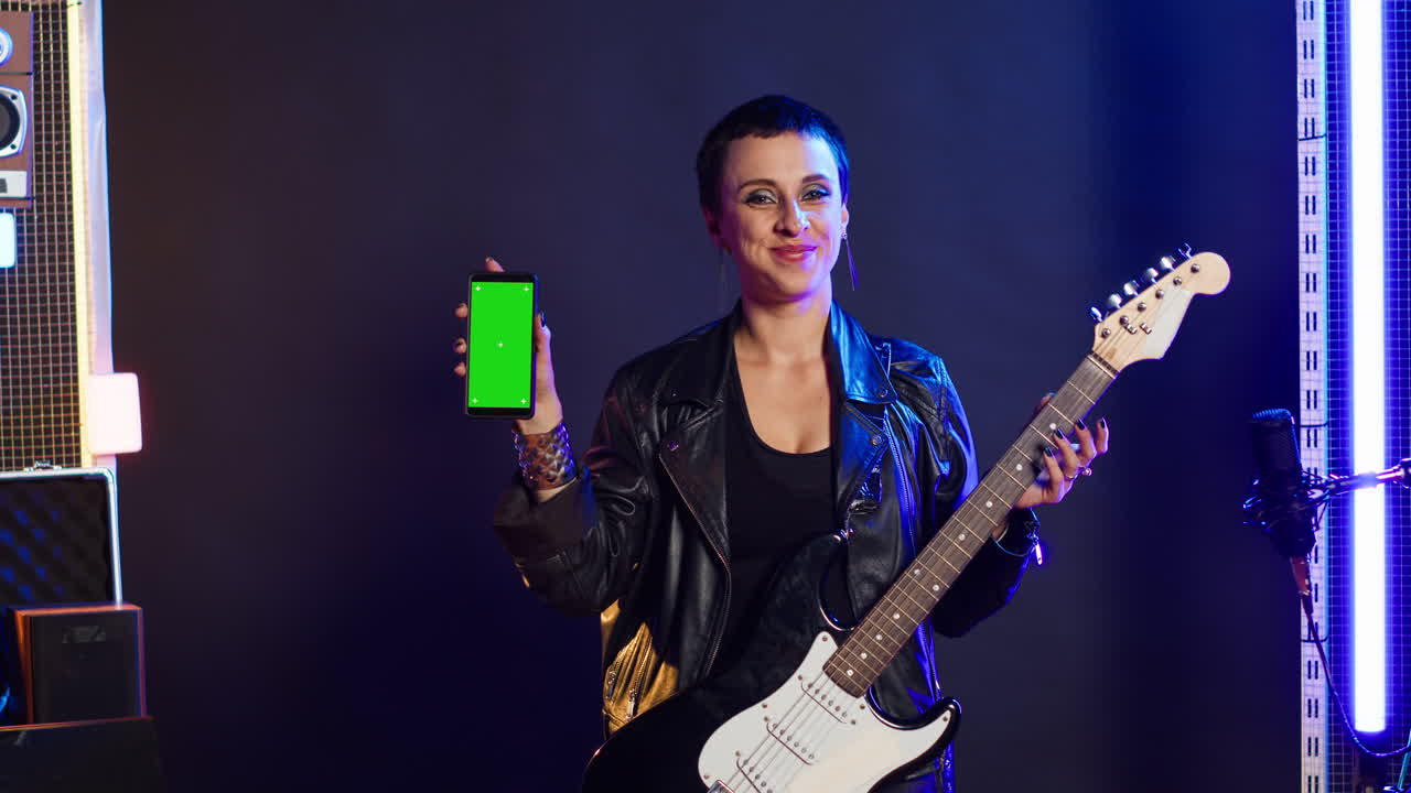 Woman with Guitar and Smartphone