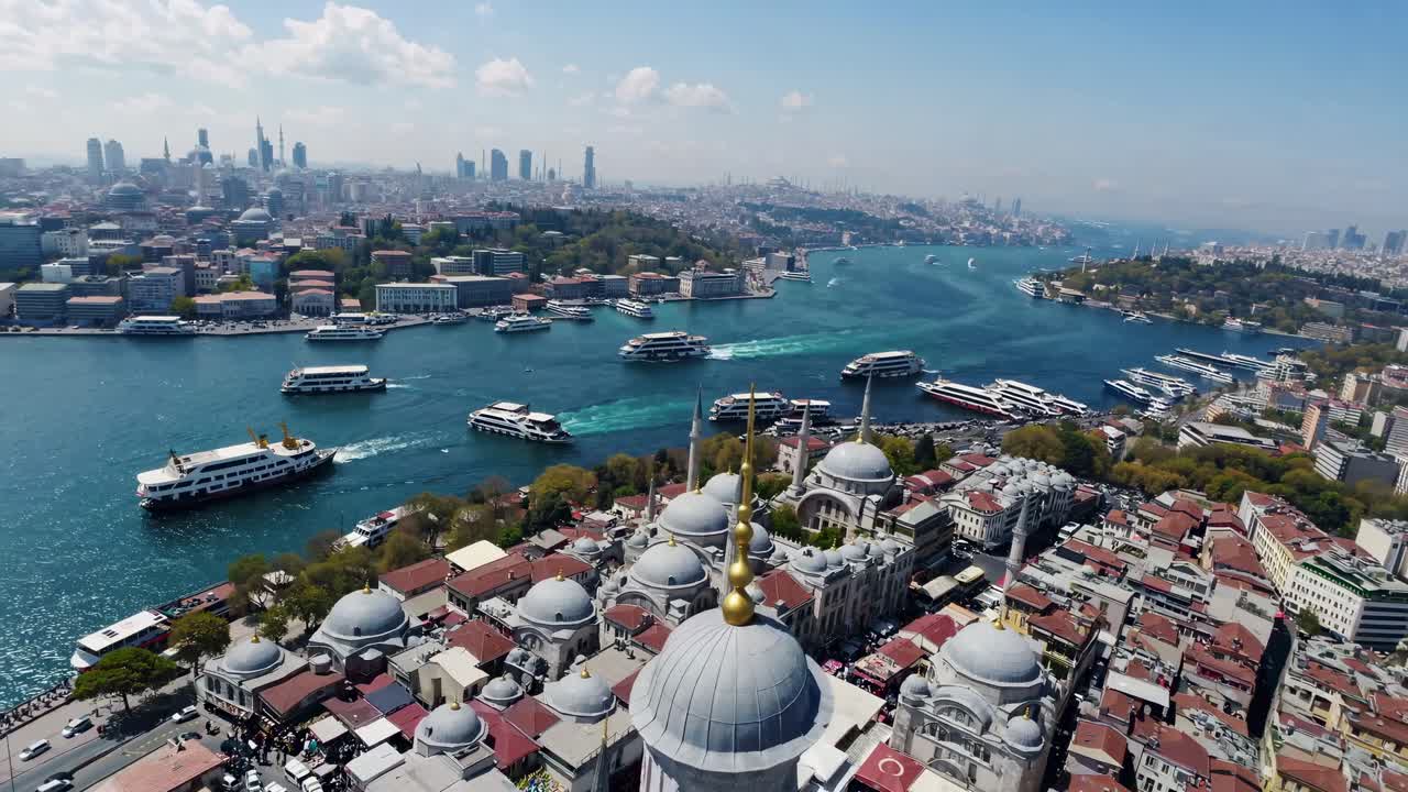Aerial video capturing a vibrant cityscape with domed rooftops and bustling waterways