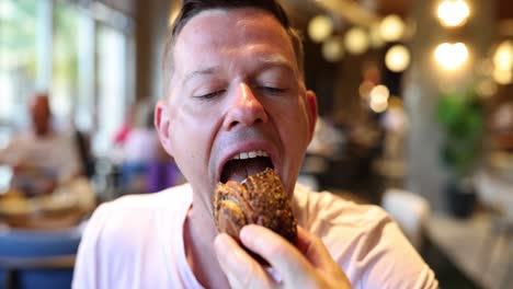 Man eating a donut