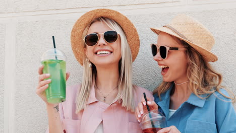 two friends enjoying summer drinks