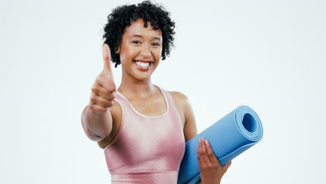 woman face, yoga mat and thumbs up in studio happy
