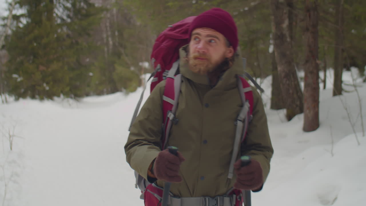 Man Hiking in Nature on Winter Day