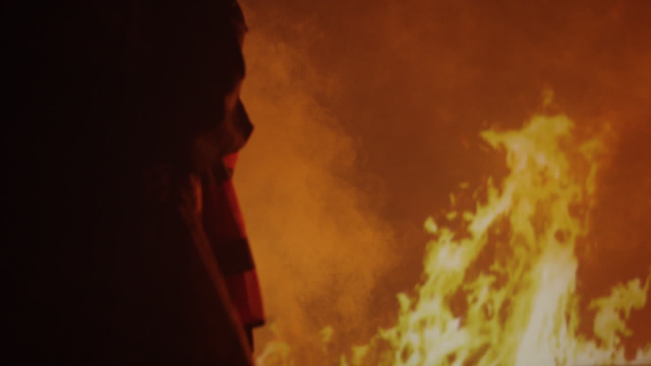 Firefighter Rescuing Person from Fire