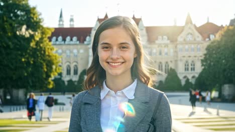 smiling young woman portrait outdoors