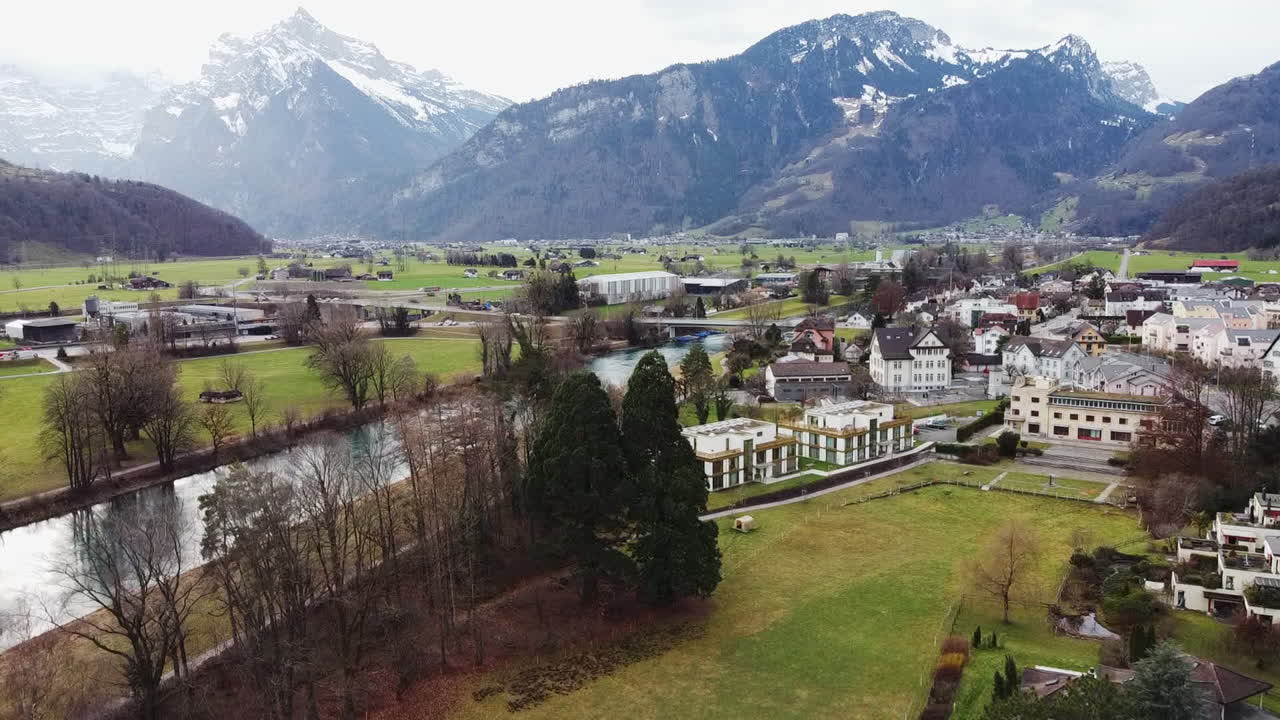 Aerial perspective of Weesen and its river in canton St. Gallen, Switzerland.