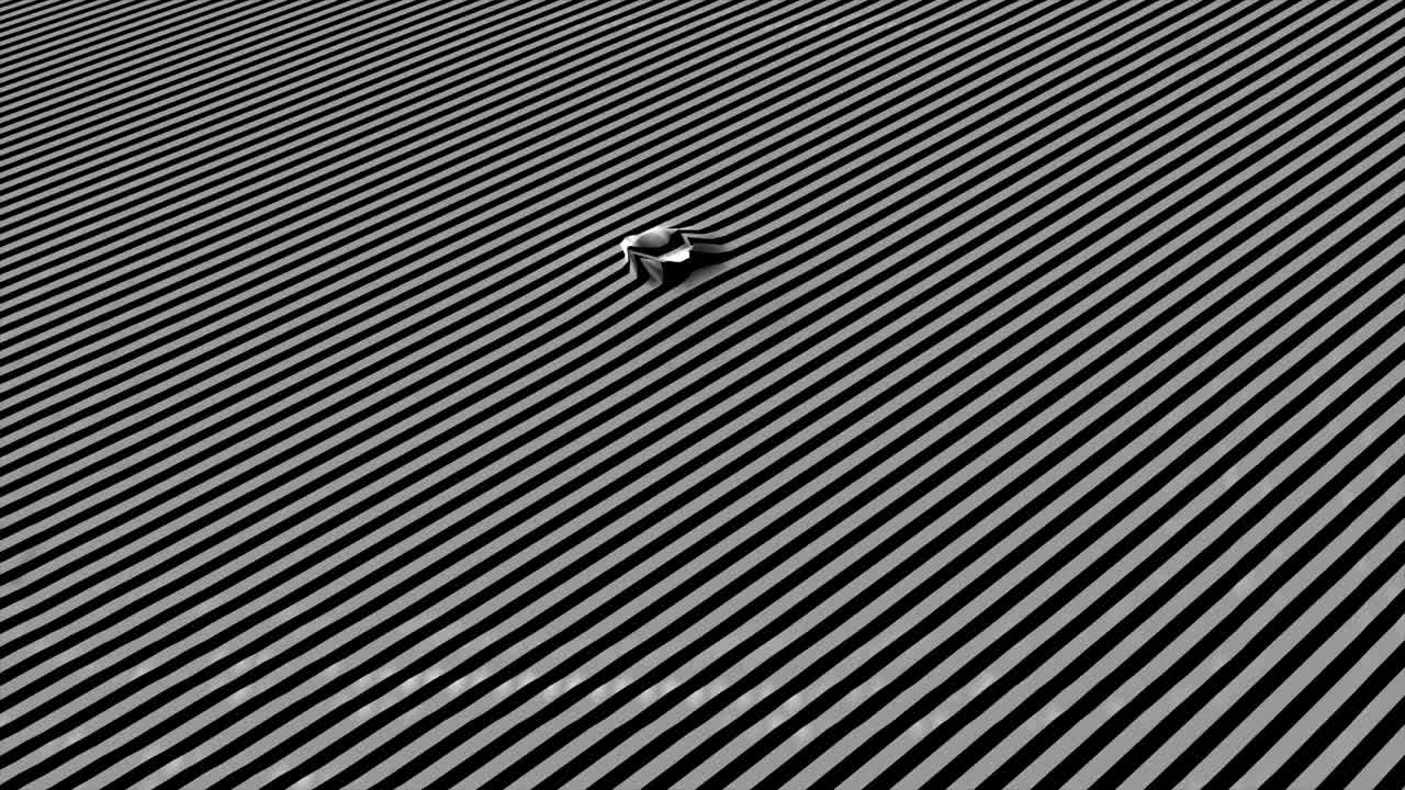 Abstract black and white wave pattern with a circular shape in the center