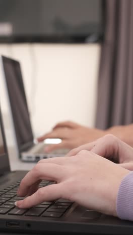 Focused Young freelancer couple sitting at desk working at home. Freelance, home office, remote work, online concept