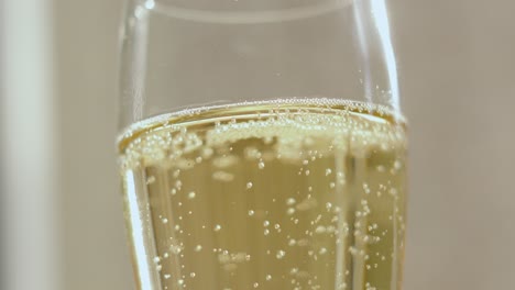 close-up of champagne bubbles in a flute