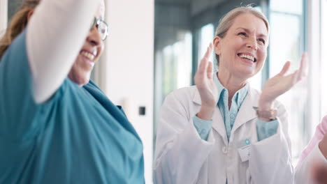 doctor, team and applause in celebration