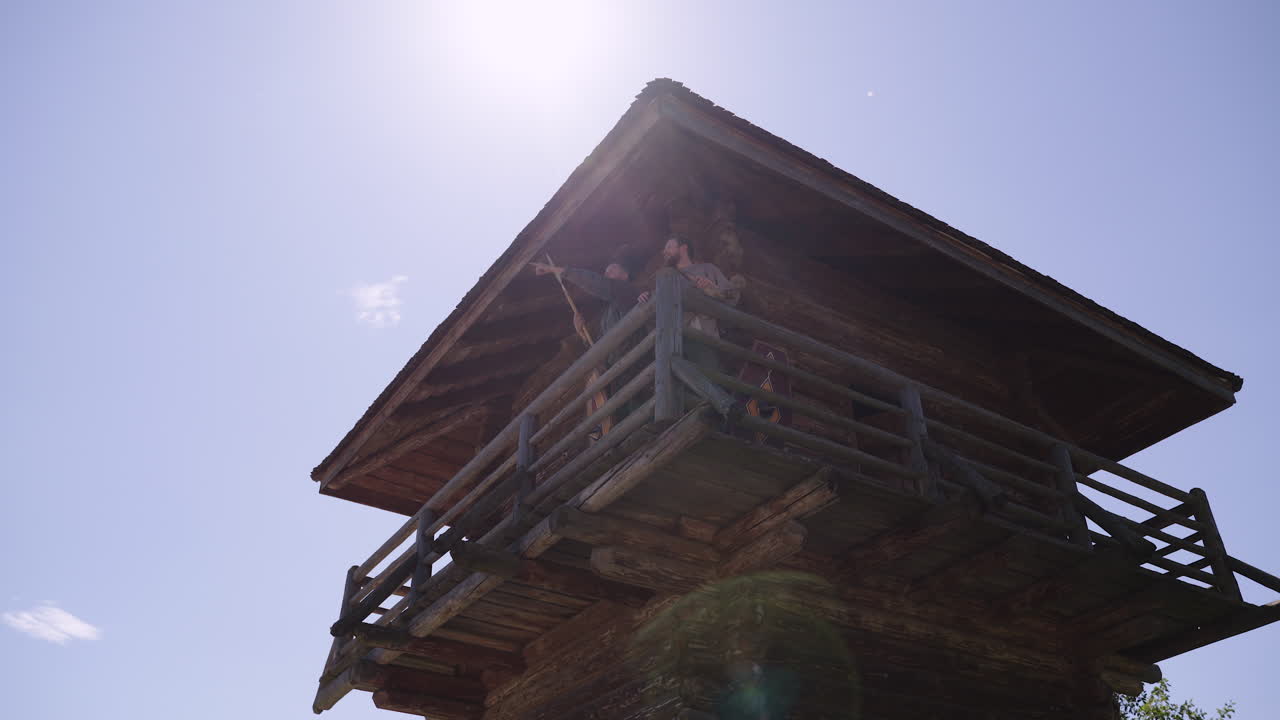 Wooden Observation Tower with People