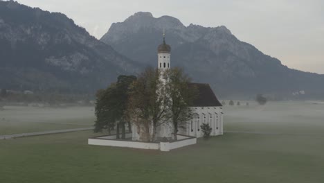 neuschwanstein church misty morning | 4k | dji mavic 2 pro d-log - perfect for colour grading