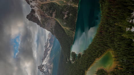 Vertical-4k-Time-Lapse-of-Pristine-Nature-of-Canada,-Clouds-Moving-Above-Picturesque-Valley-and-Snow-Capped-Hills